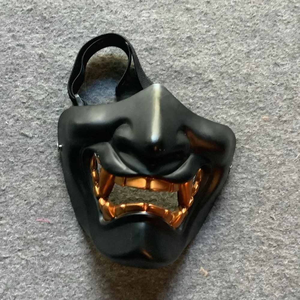 Black and Gold Mask with adjustable strap